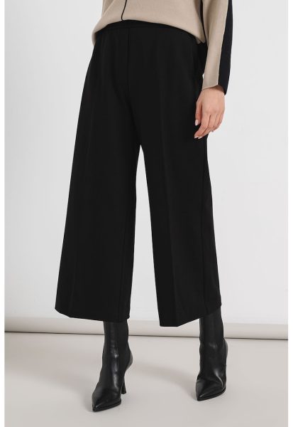Pantaloni crop evazati