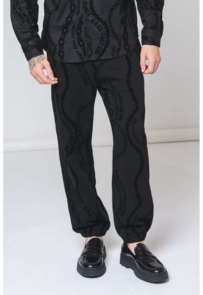 Pantaloni din bumbac cu talie medie si model grafic
