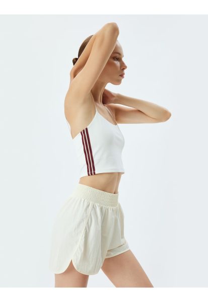 Top cu model in dungi si bretele inguste