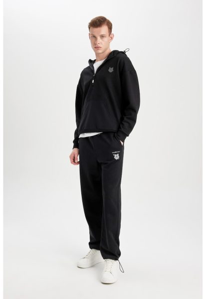 Pantaloni de trening cu buzunare oblic