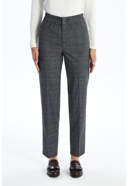 Pantaloni in carouri cu buzunare oblice